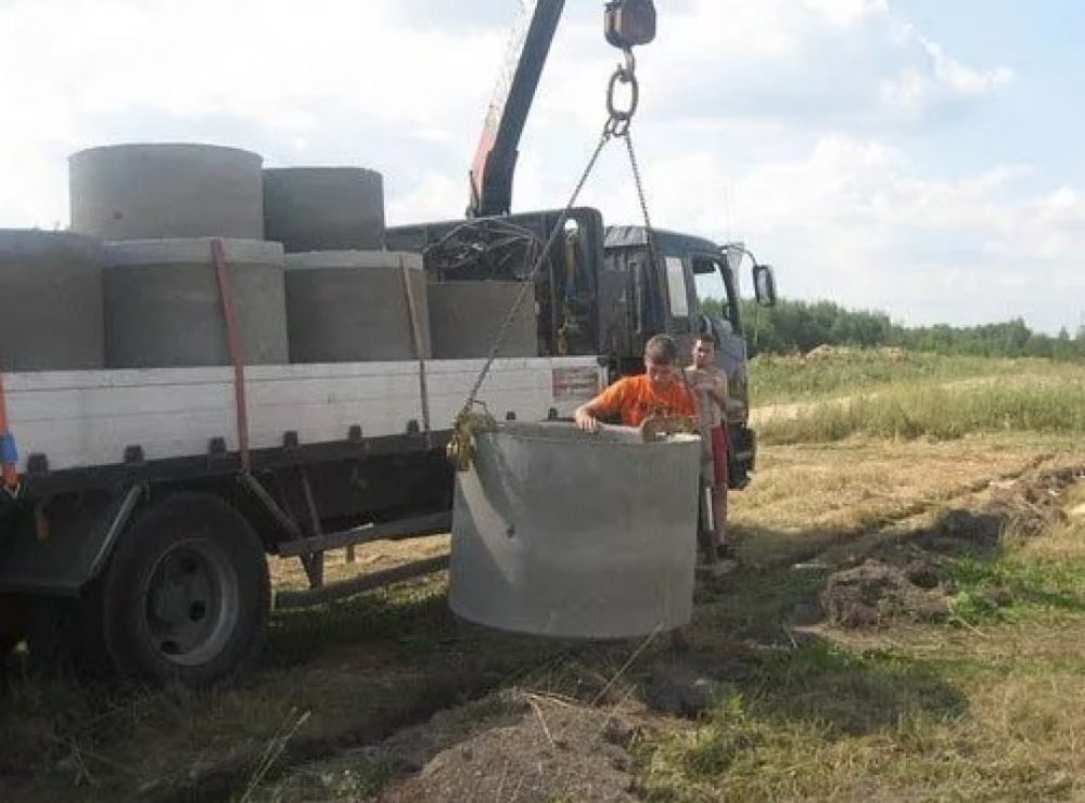 Перевозка бетонных колец и колодцев манипулятором стоимость услуг и где заказать - Архангельск
